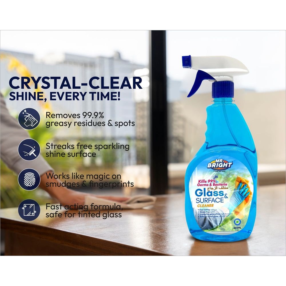 Mr Bright Glass & Surface Cleaner 750ML bottle on table with features listed: Removes 99.9% residues, streak-free shine, works on smudges, safe for tinted glass